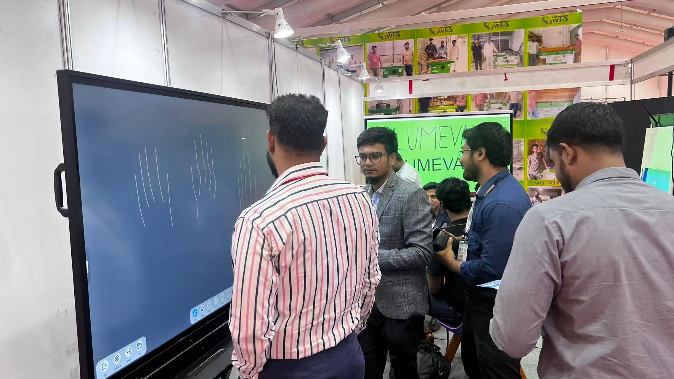 Education professionals consulting about interactive flat panels